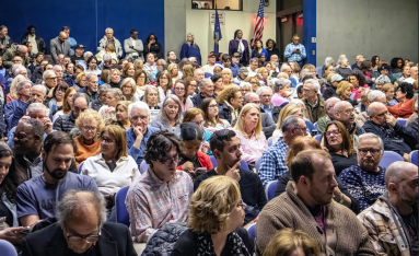 Audience listening to Gillen speak.